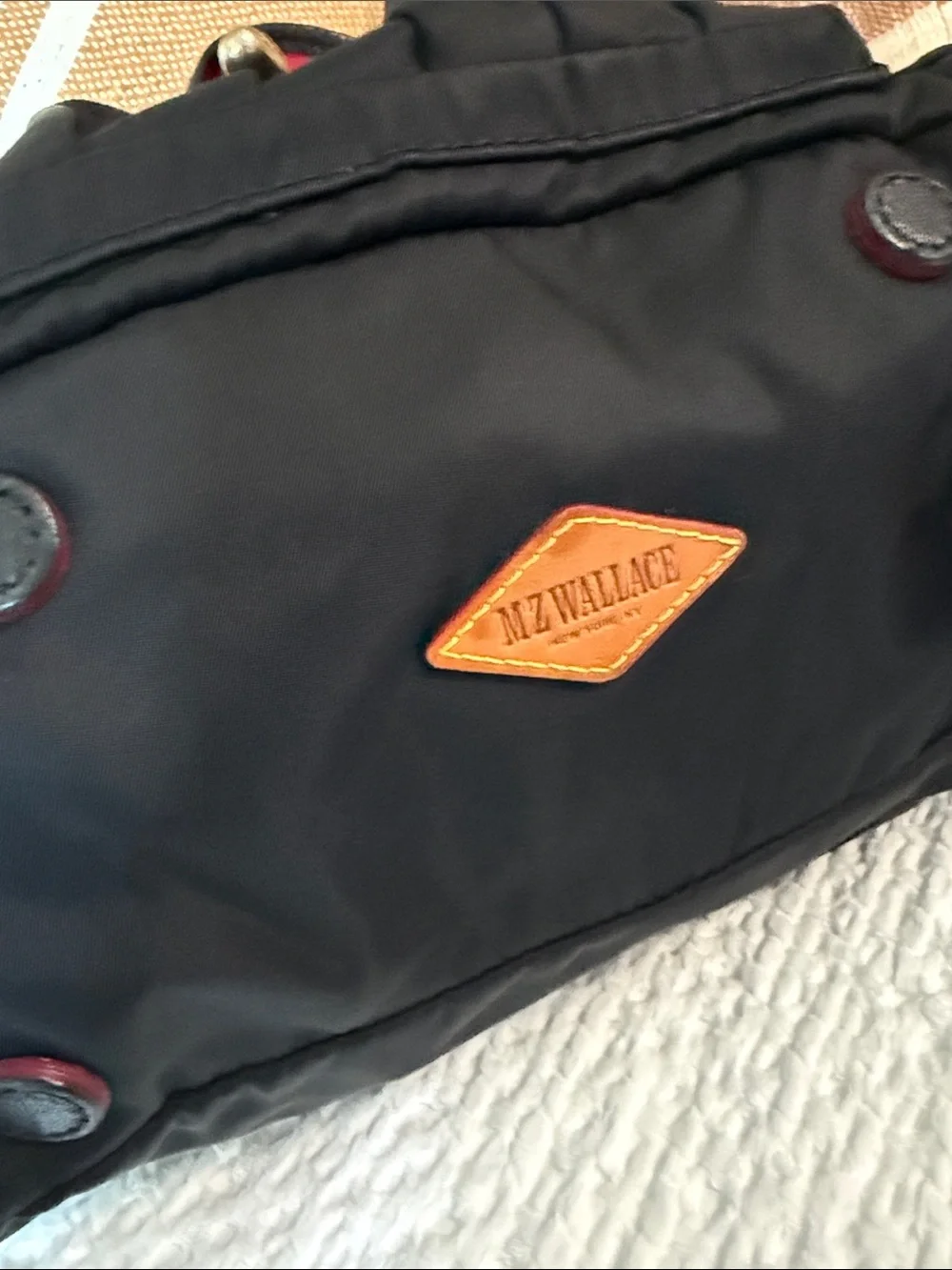 MZ Wallace Black Drawstring Backpack with Buckle Flap